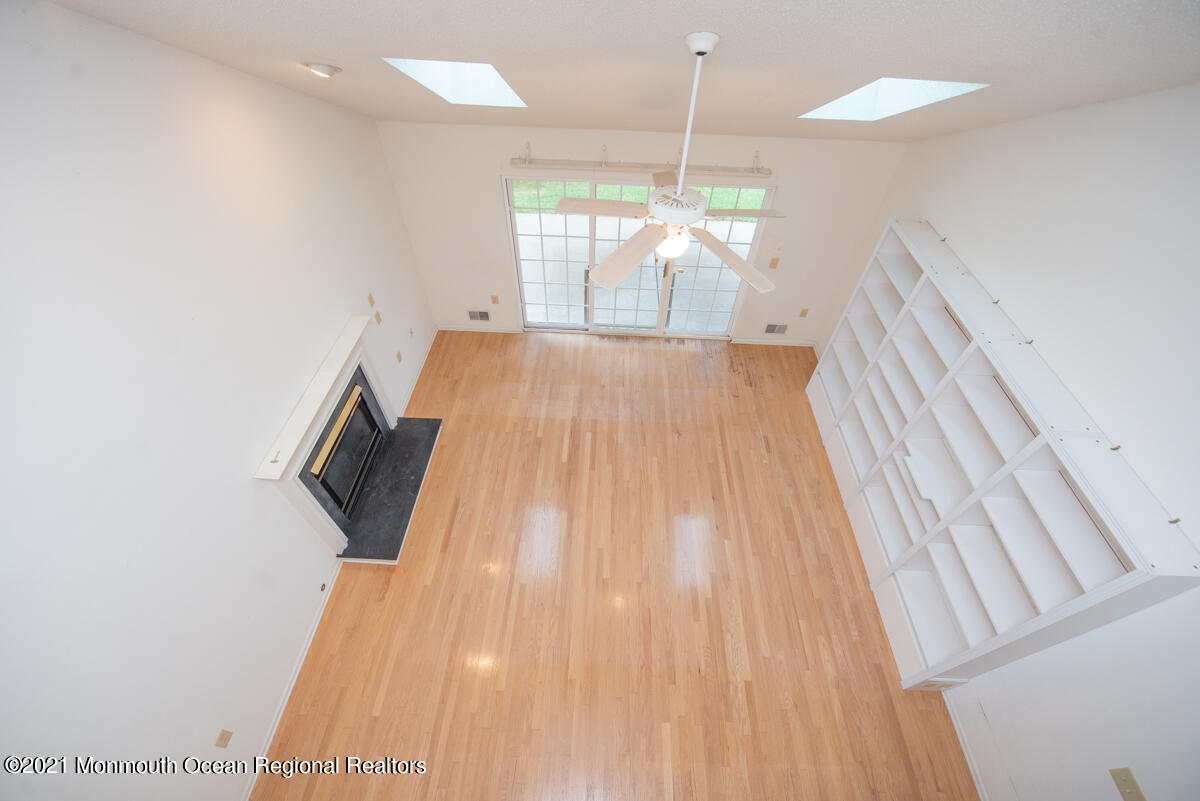 5 Dexter Lane Jackson, NJ 08527 - Photo 20 of 55 a view of a living room with a wooden floor