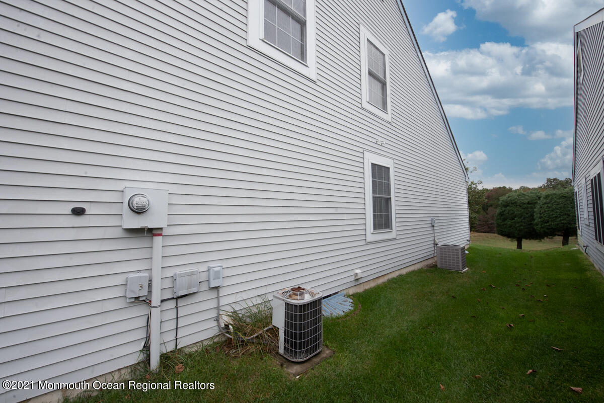 5 Dexter Lane Jackson, NJ 08527 - Photo 45 of 55 a front view of a house with a garden