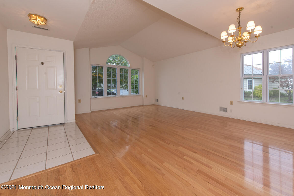 5 Dexter Lane Jackson, NJ 08527 - Photo 6 of 55 a view of an empty room with a window