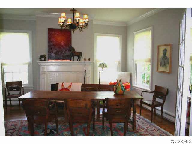 13302 Chula Road Amelia Court House, VA 23002 - Photo 4 of 8 a view of a dining room with furniture and chandelier