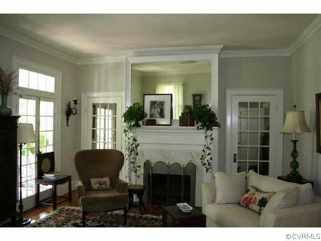 13302 Chula Road Amelia Court House, VA 23002 - Photo 5 of 8 a living room with furniture and a fireplace
