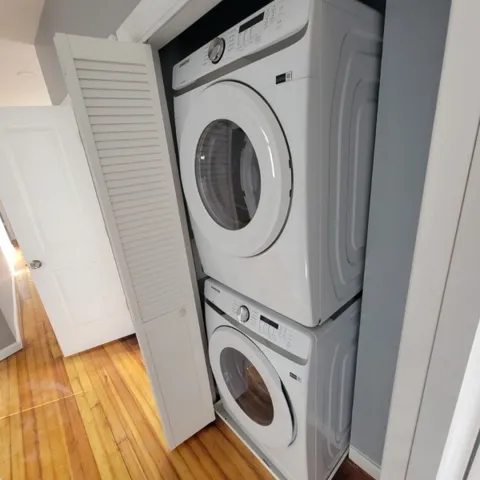 a utility room with dryer and washer