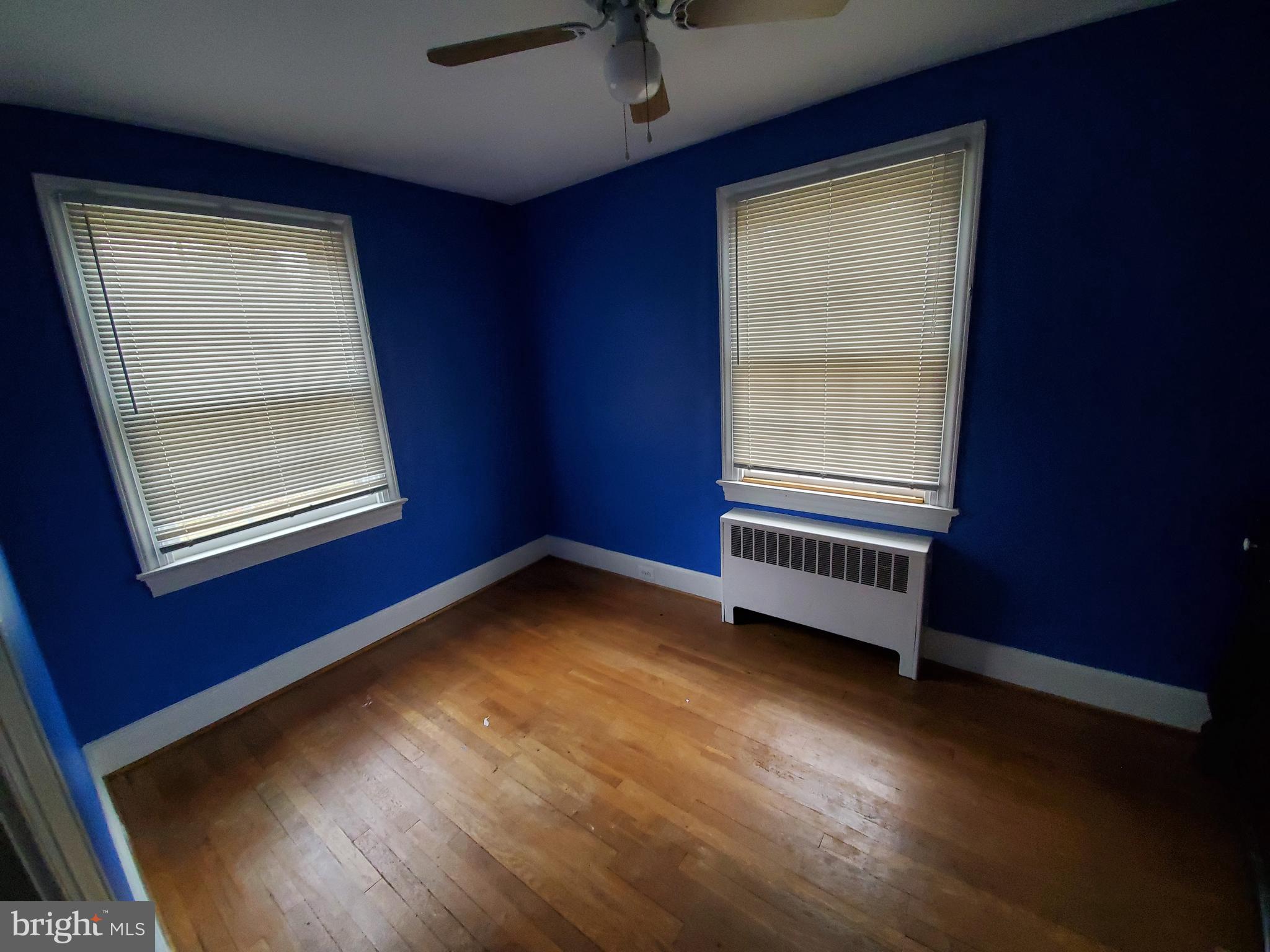 527 Old Meetze Road Warrenton, VA 20186 - Photo 8 of 10 an empty room with windows