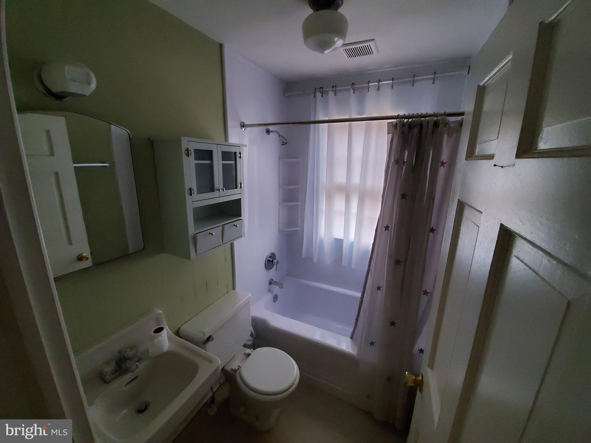 527 Old Meetze Road Warrenton, VA 20186 - Photo 9 of 10 a bathroom with a granite countertop sink toilet and shower