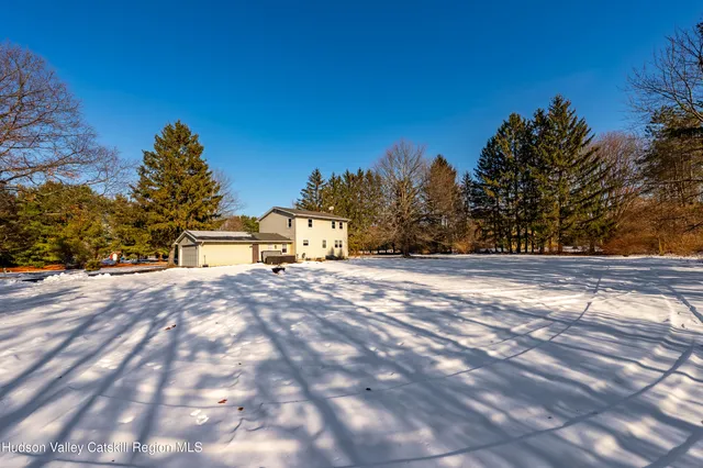 a view of kitchen with furniture and wooden floor