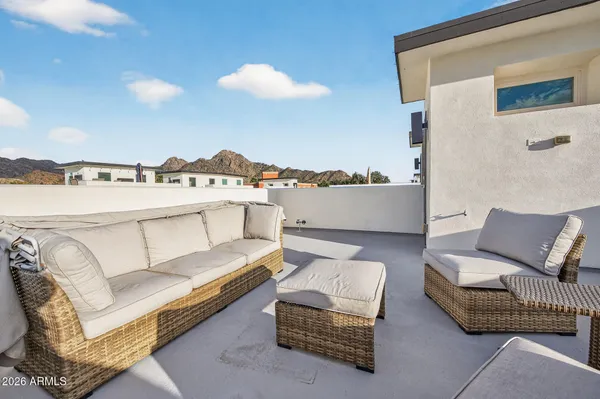 a outdoor living room with furniture