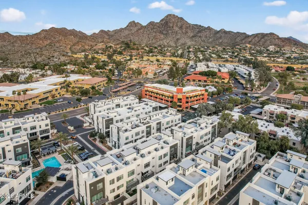 a view of city with tall buildings