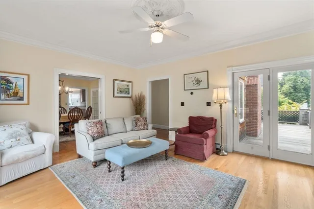 a living room with furniture and a rug