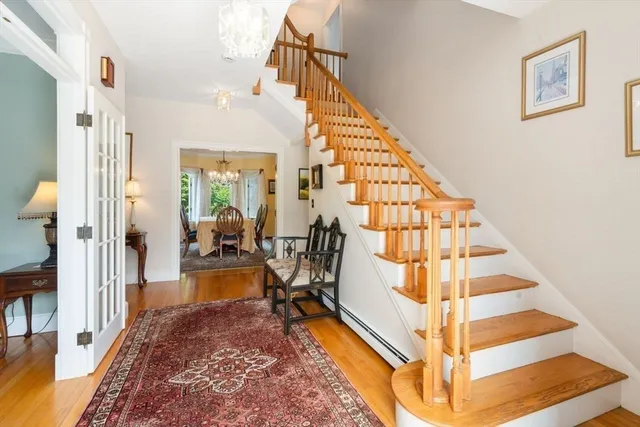 a view of staircase with open living room