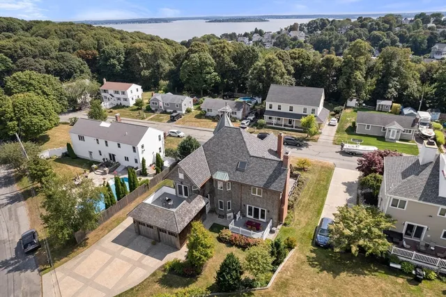 an aerial view of a house with a garden