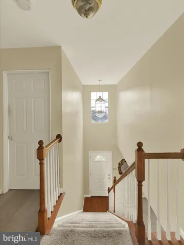 a view of a livingroom with a staircase