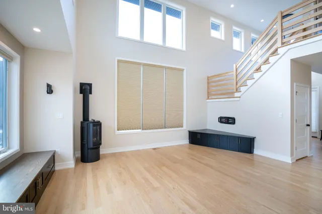 a kitchen with granite countertop a stove and a sink