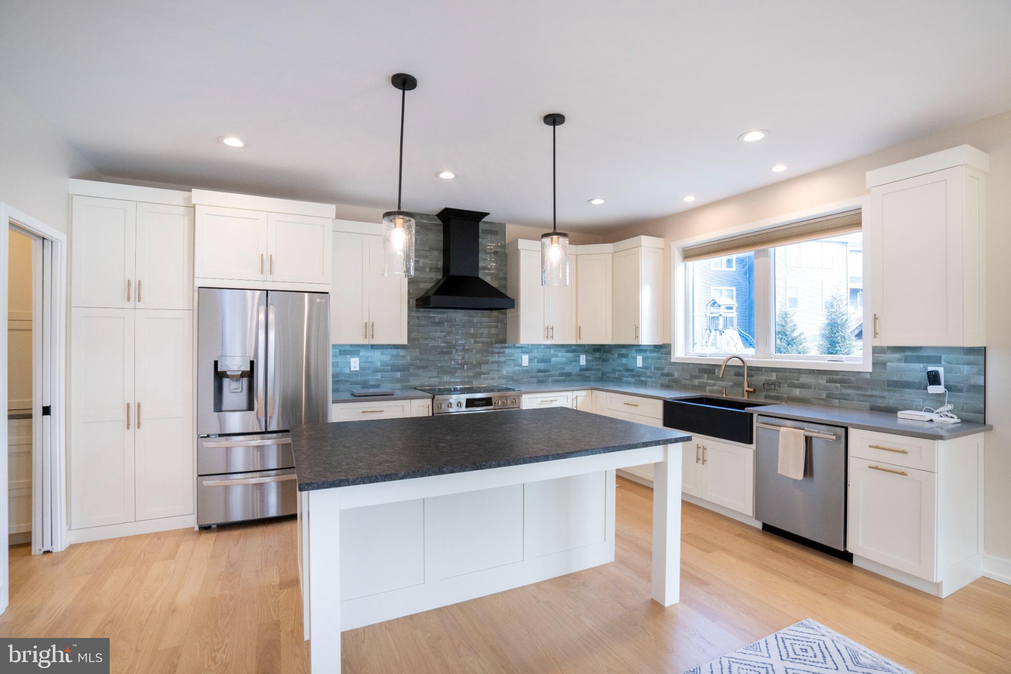 390 Trout Road State College, PA 16801 - Photo 19 of 93 Modern kitchen with sleek design and light.