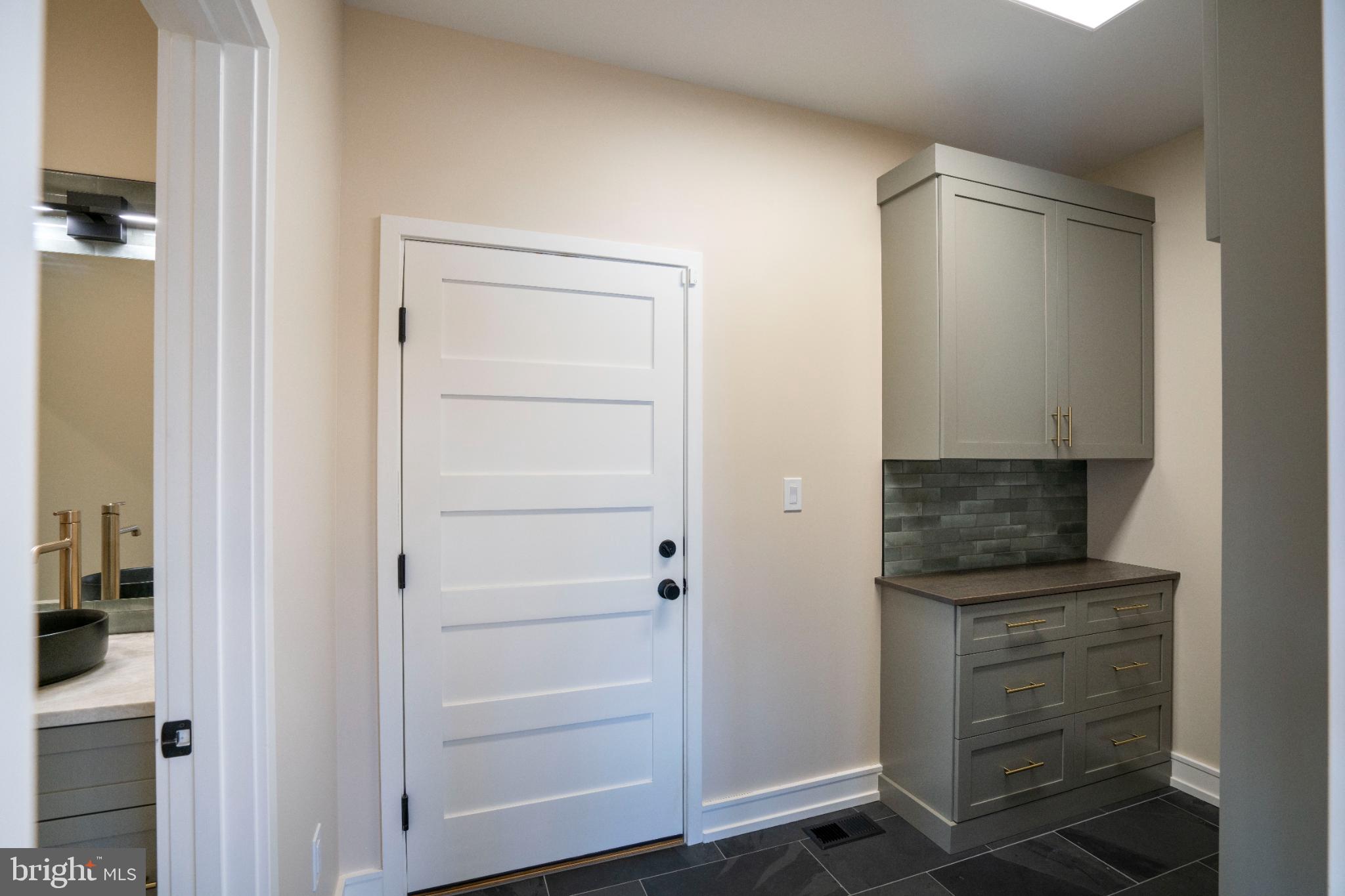 390 Trout Road State College, PA 16801 - Photo 27 of 93 Modern entryway with sleek cabinetry.