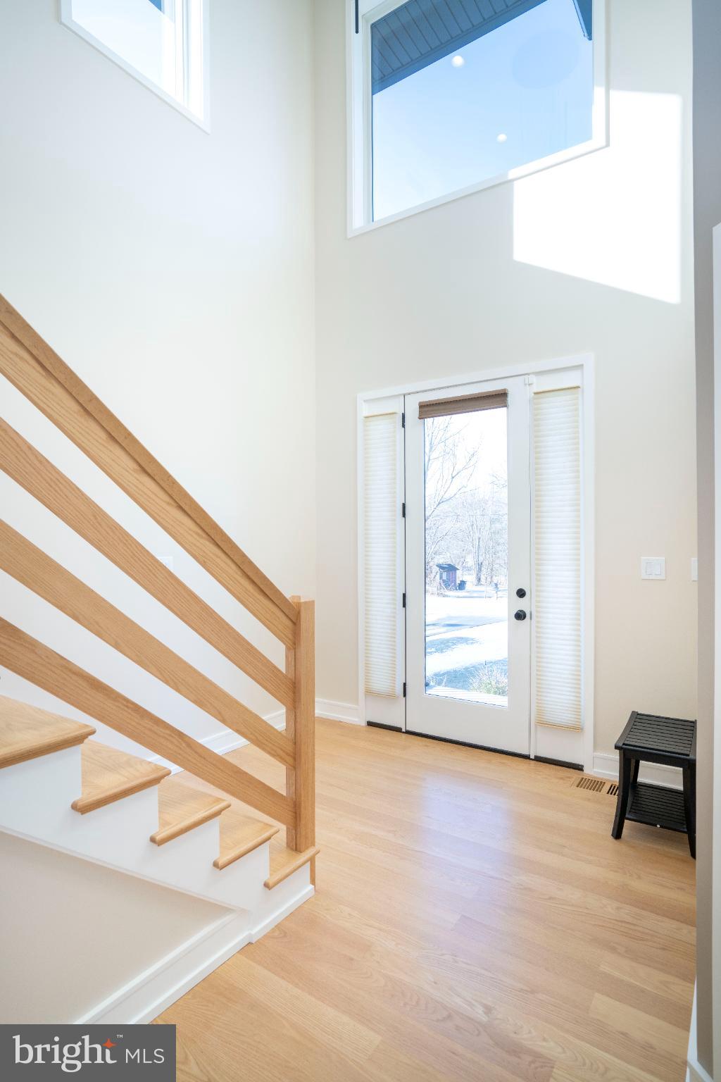 390 Trout Road State College, PA 16801 - Photo 37 of 93 Bright entryway with modern staircase.