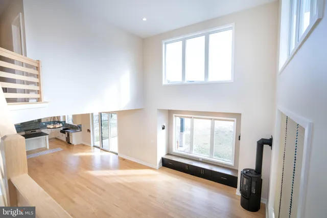 a bathroom with a sink a tub and a mirror