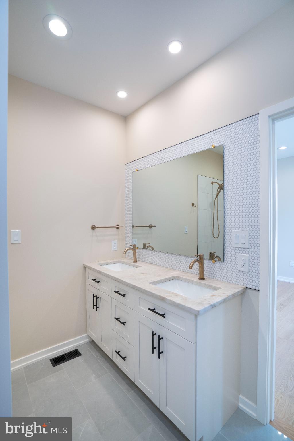 390 Trout Road State College, PA 16801 - Photo 50 of 93 Sleek modern bathroom with dual sinks.