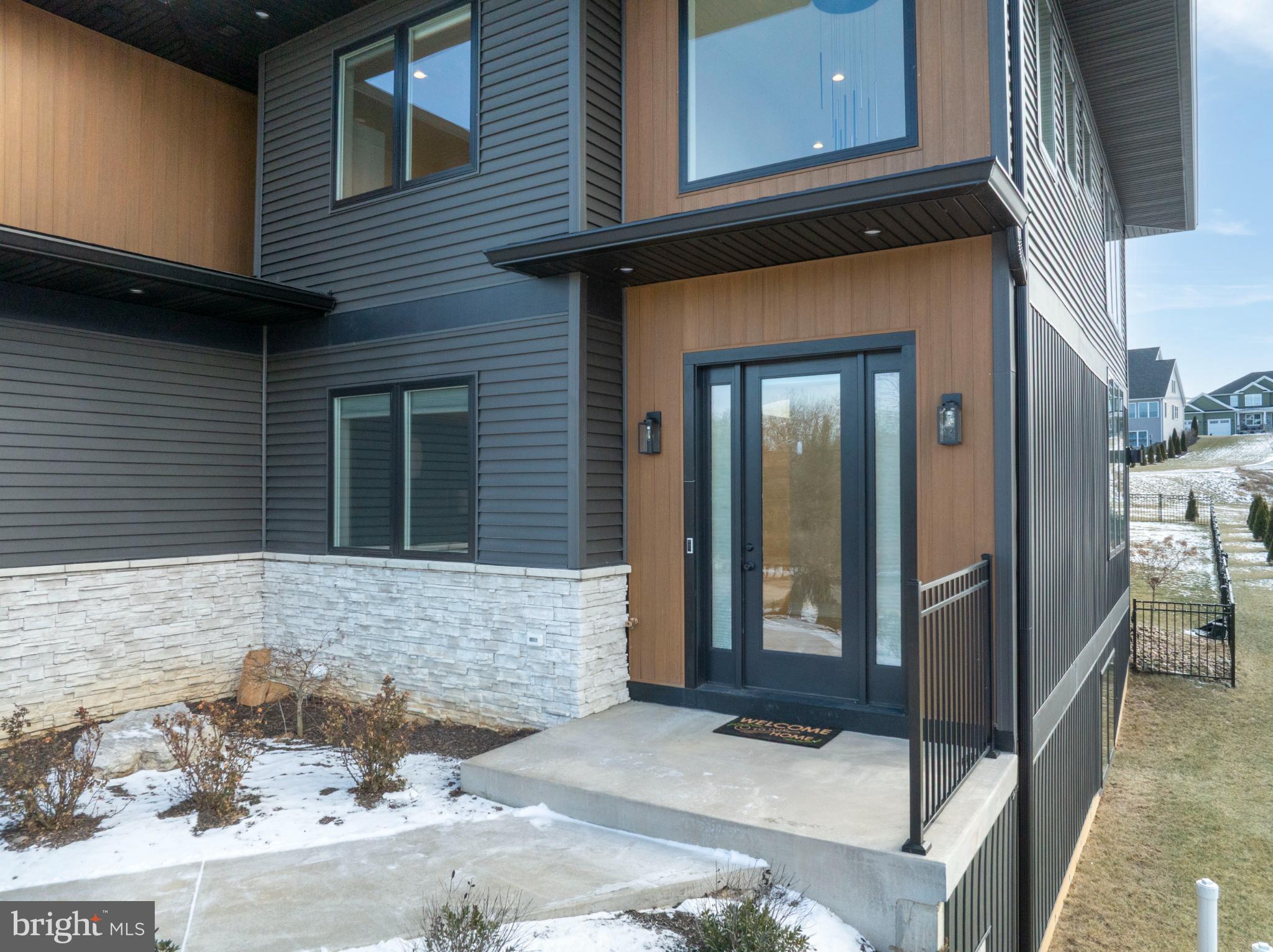 390 Trout Road State College, PA 16801 - Photo 5 of 93 Modern entrance with sleek design elements.