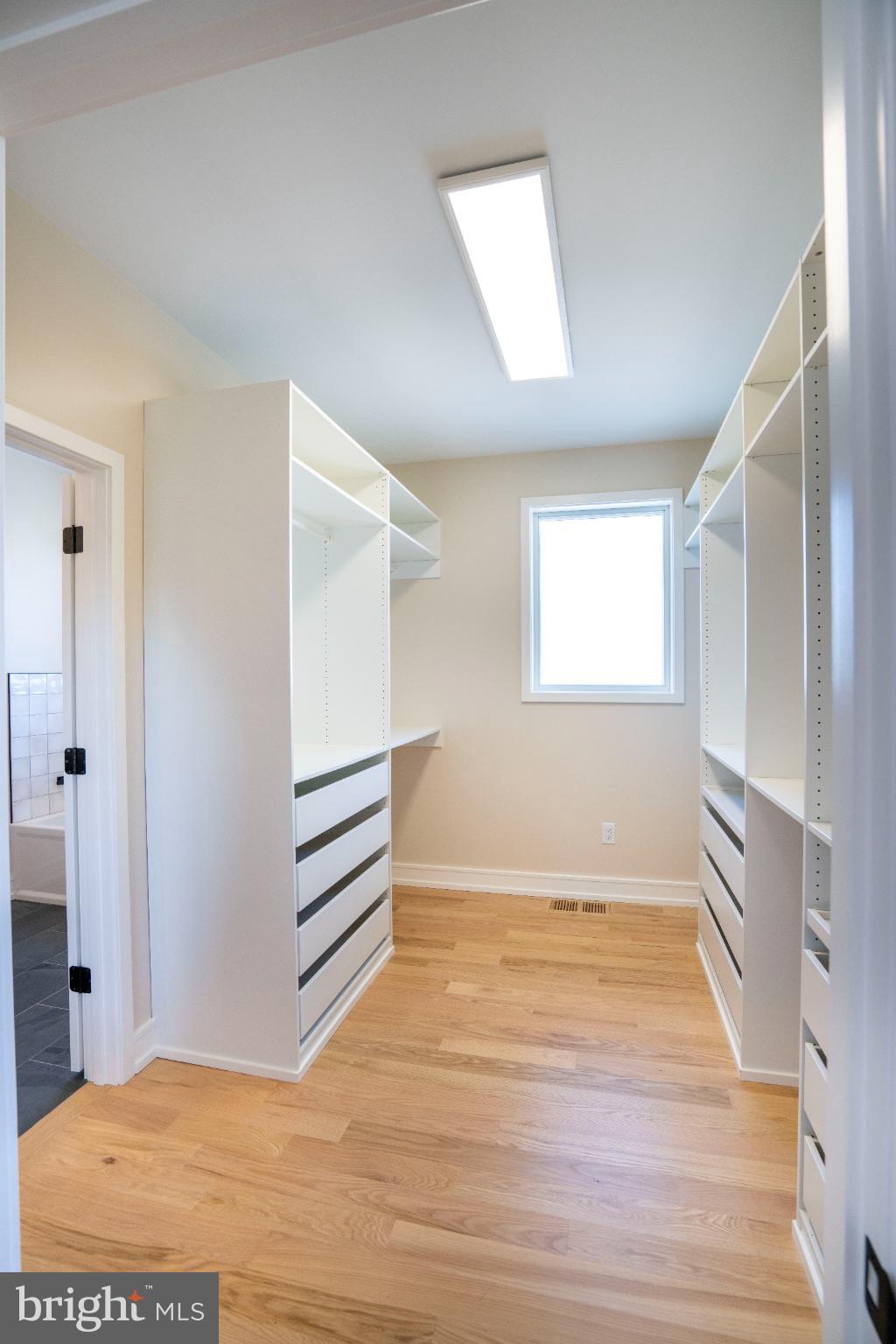 390 Trout Road State College, PA 16801 - Photo 63 of 93 Spacious, bright walk-in closet with storage.