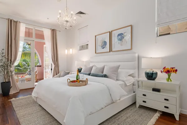 a bedroom with a bed and a large dresser