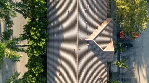 a view of a backyard with chairs
