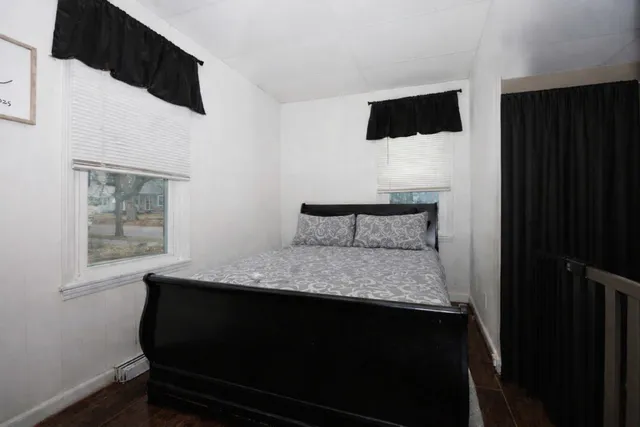 a view of a house with wooden floor and brick walls
