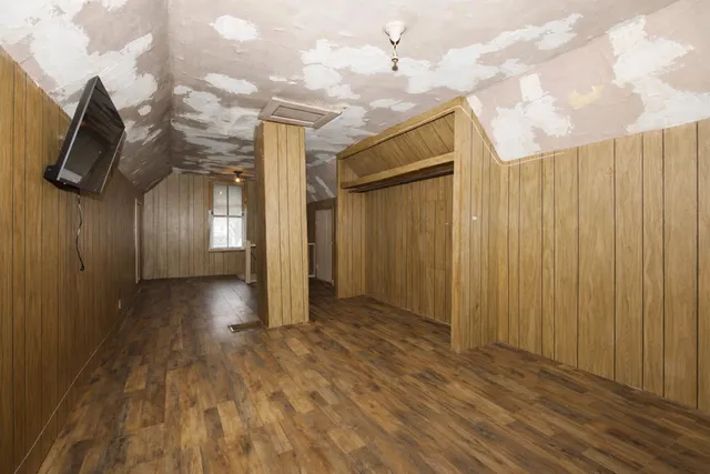 a kitchen with stainless steel appliances a refrigerator and a stove