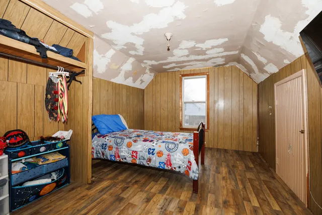 a view of a house with a tree