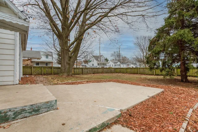 a house with trees in front of it