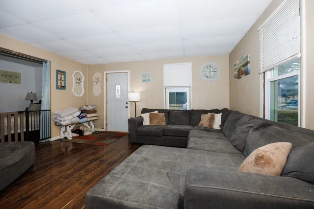 a living room with furniture and a couch