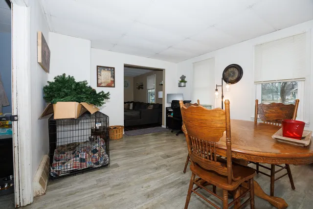 a living room with furniture and a table