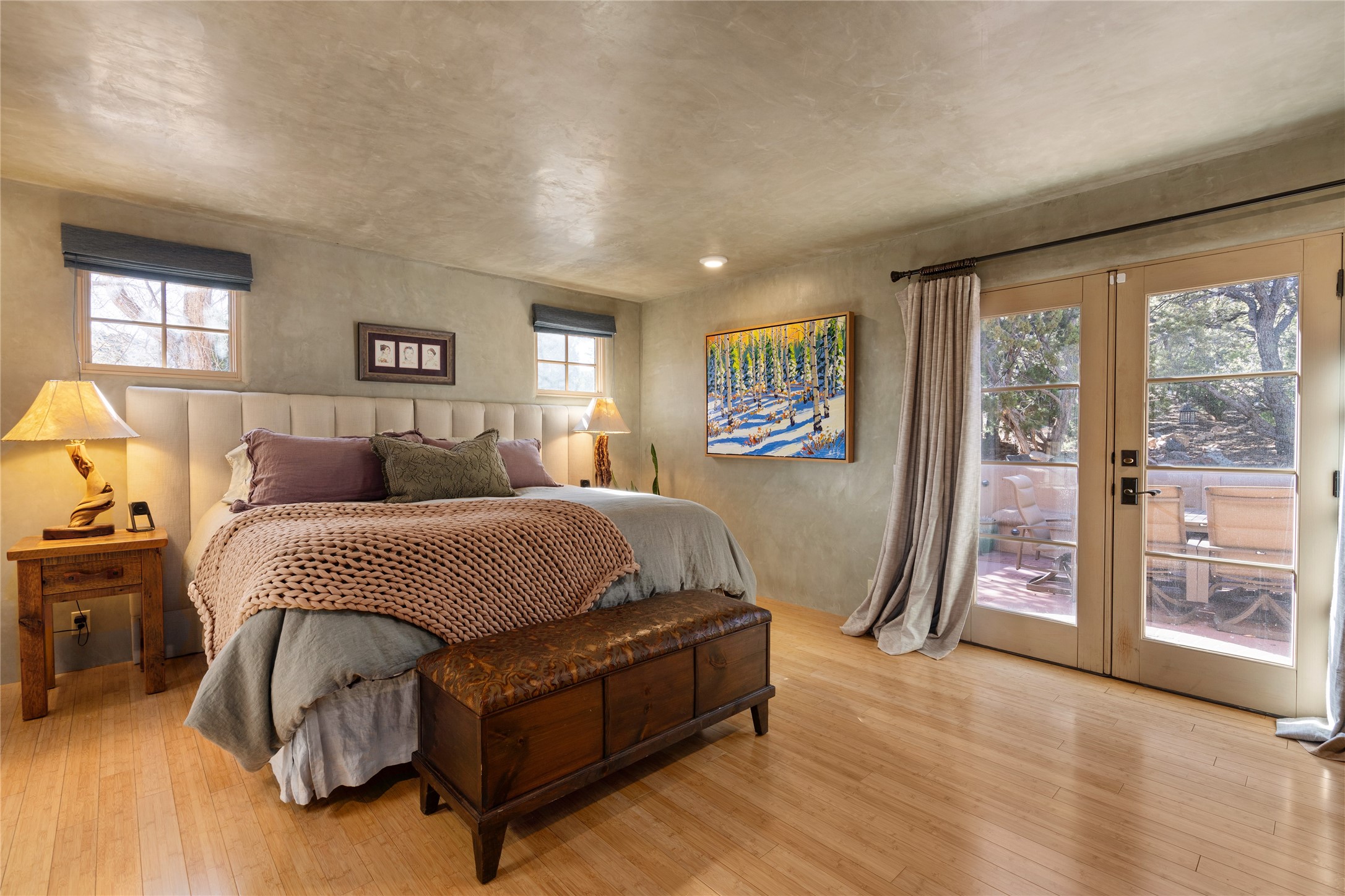 1204 Bandolina Road Santa Fe, NM 87501 - Photo 20 of 69 Primary bedroom, doors to back patio