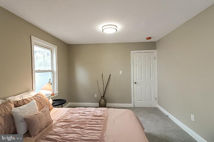 5097 Sheriff Road Northeast Washington, DC 20019 - Photo 9 of 34 First Bedroom