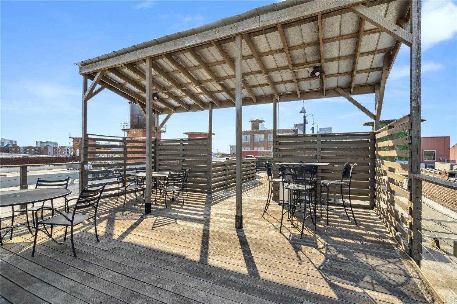 413 South Main Street, Unit 206 Memphis, TN 38103 - Photo 19 of 23 a roof deck view with table and chairs