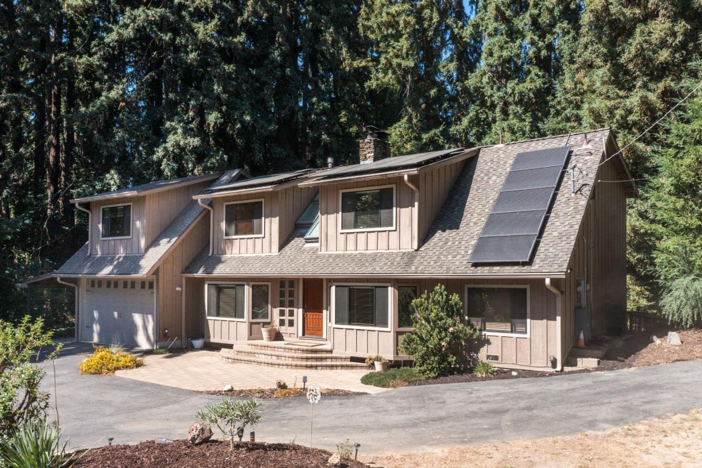 22682 Summit Road Los Gatos, CA 95033 - Photo 1 of 32 a front view of a house with garden