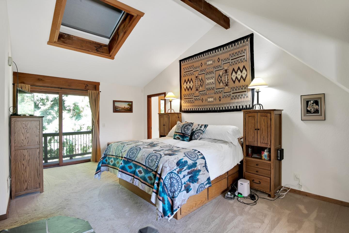 22682 Summit Road Los Gatos, CA 95033 - Photo 13 of 32 a bed sitting in a bedroom next to a window