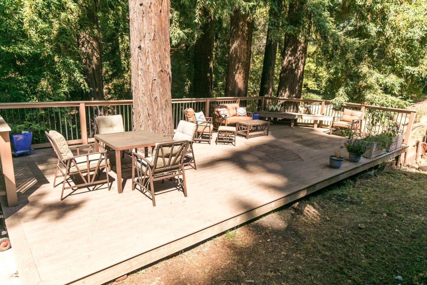 22682 Summit Road Los Gatos, CA 95033 - Photo 17 of 32 a view of a patio with a table and chairs and couches