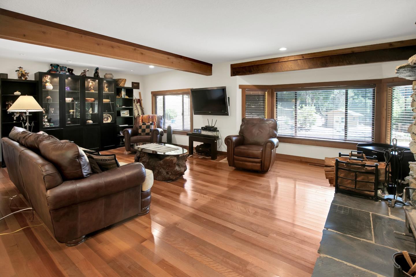 22682 Summit Road Los Gatos, CA 95033 - Photo 2 of 32 a living room with furniture fireplace and flat screen tv