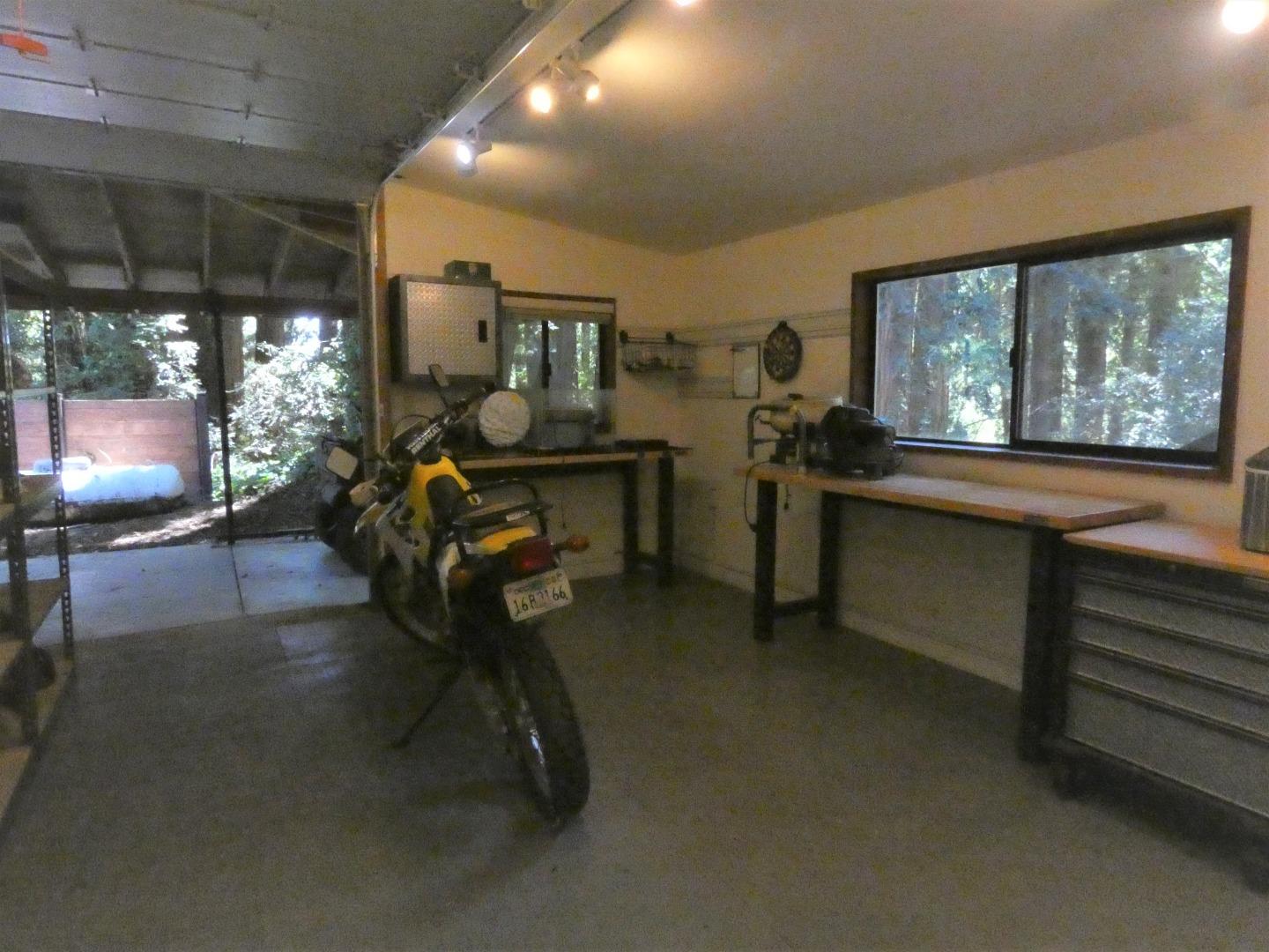 22682 Summit Road Los Gatos, CA 95033 - Photo 23 of 32 a living room with furniture a window and a table