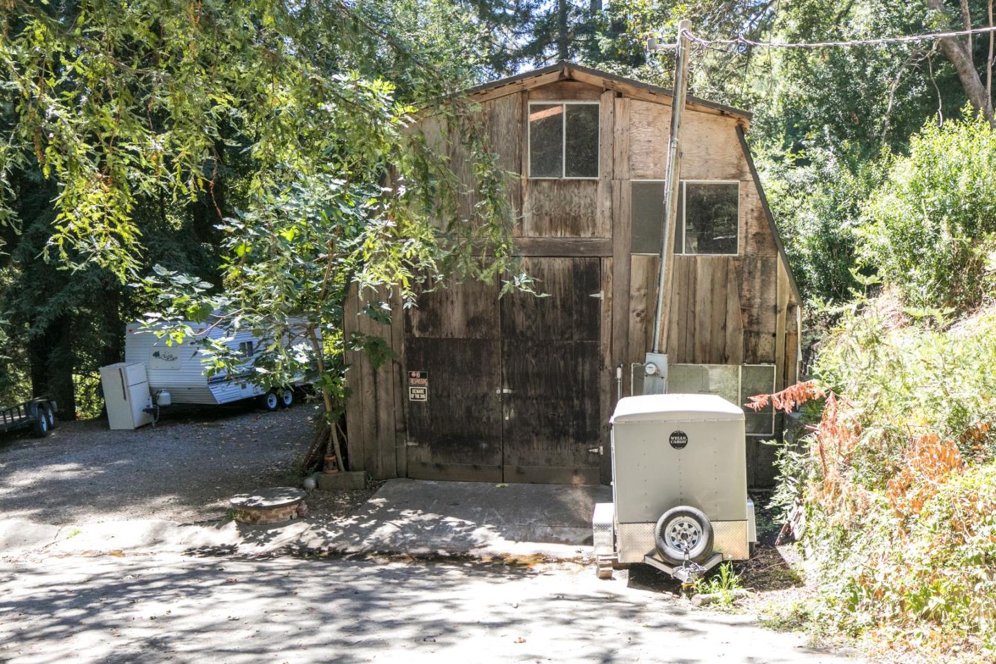 22682 Summit Road Los Gatos, CA 95033 - Photo 29 of 32 a front view of a house with a yard