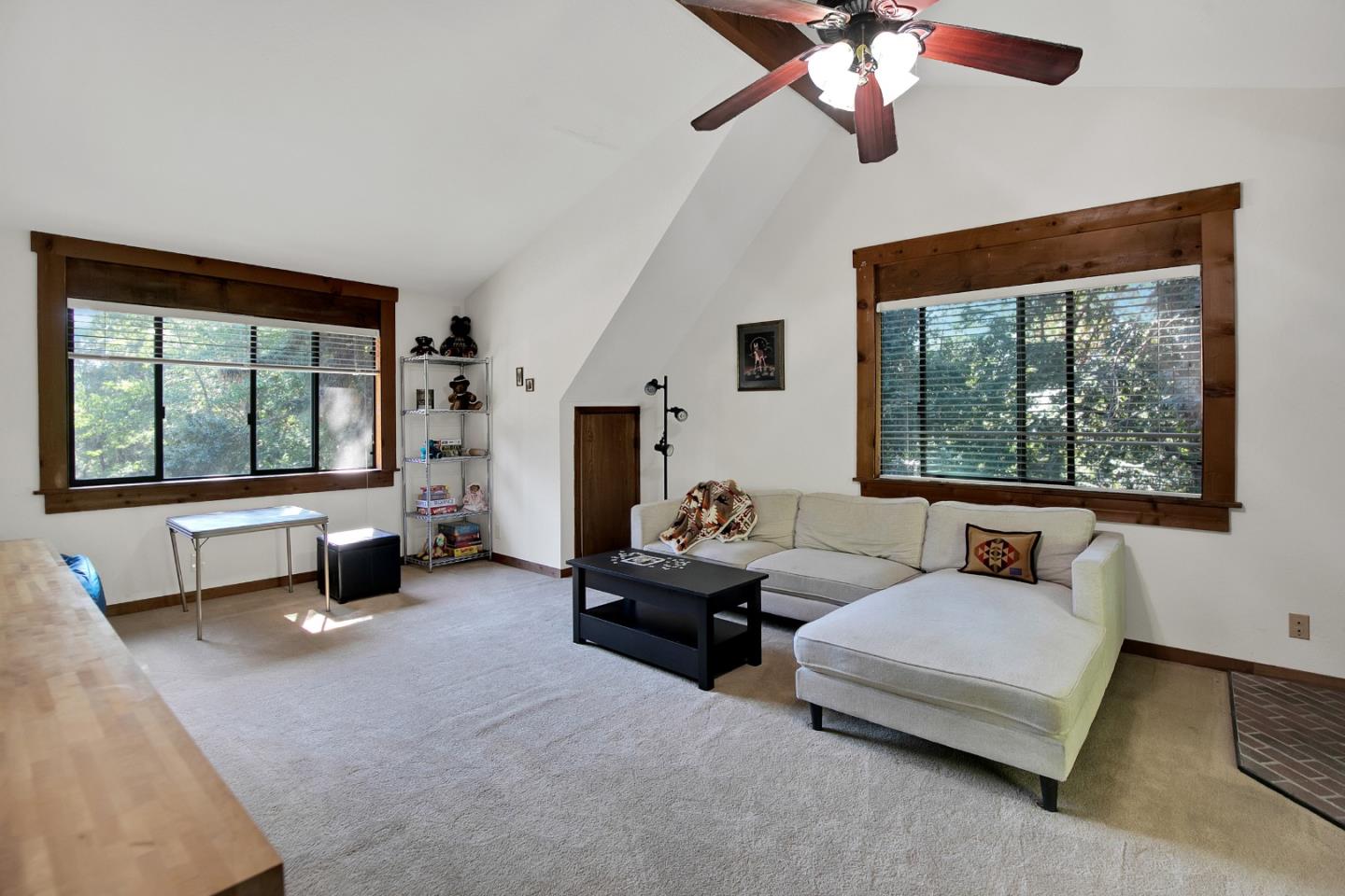 22682 Summit Road Los Gatos, CA 95033 - Photo 9 of 32 a living room with furniture and a large window