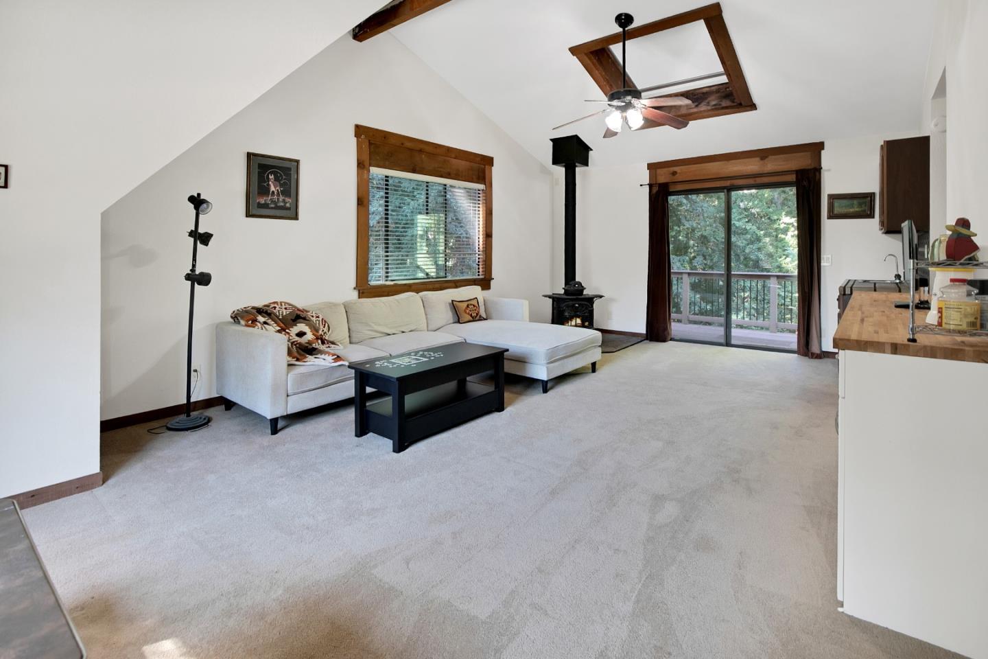 22682 Summit Road Los Gatos, CA 95033 - Photo 10 of 32 a living room with furniture and a flat screen tv