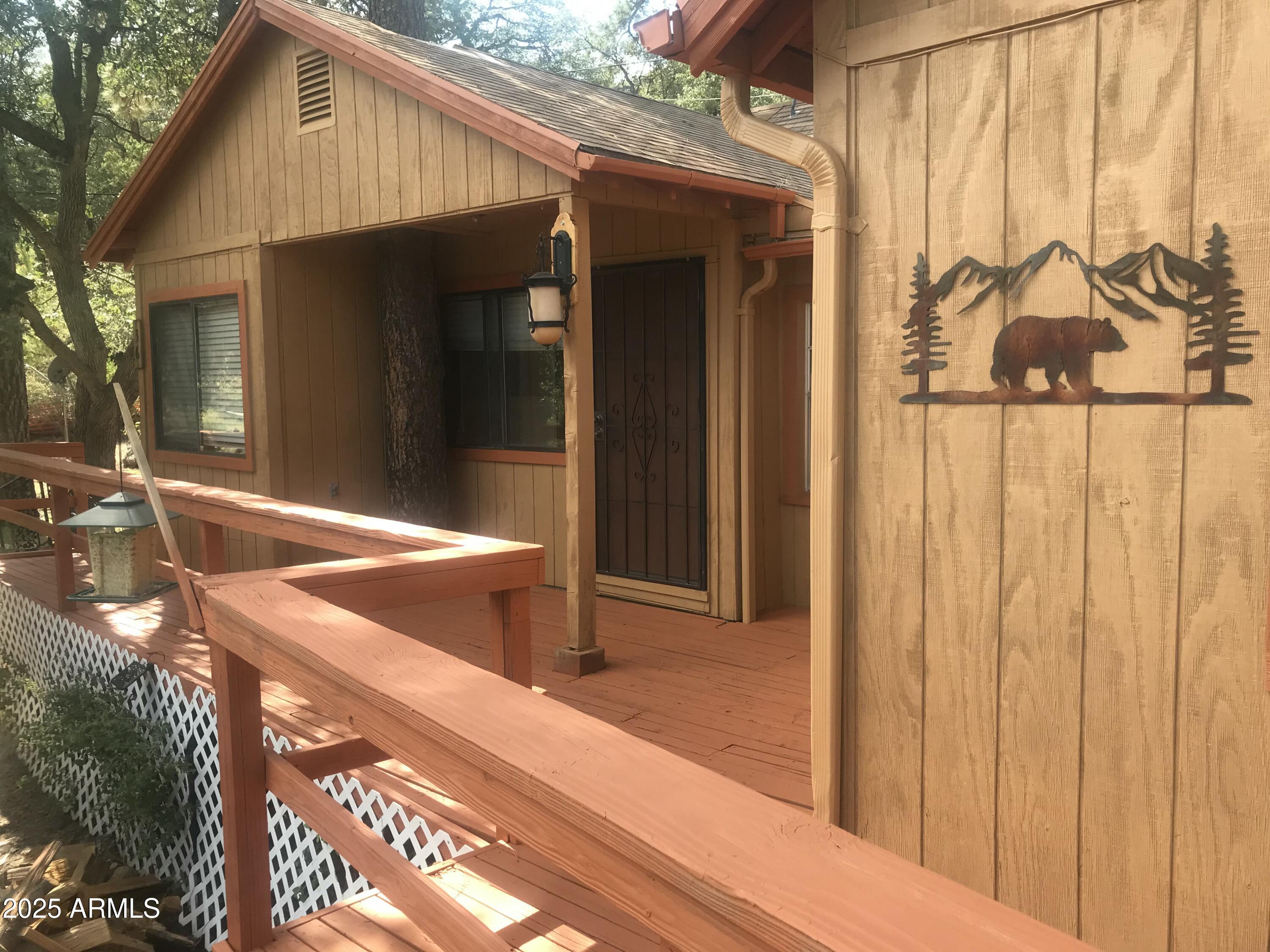 23576 Sunny South Road Crown King, AZ 86343 - Photo 1 of 29 a view of a house with a backyard