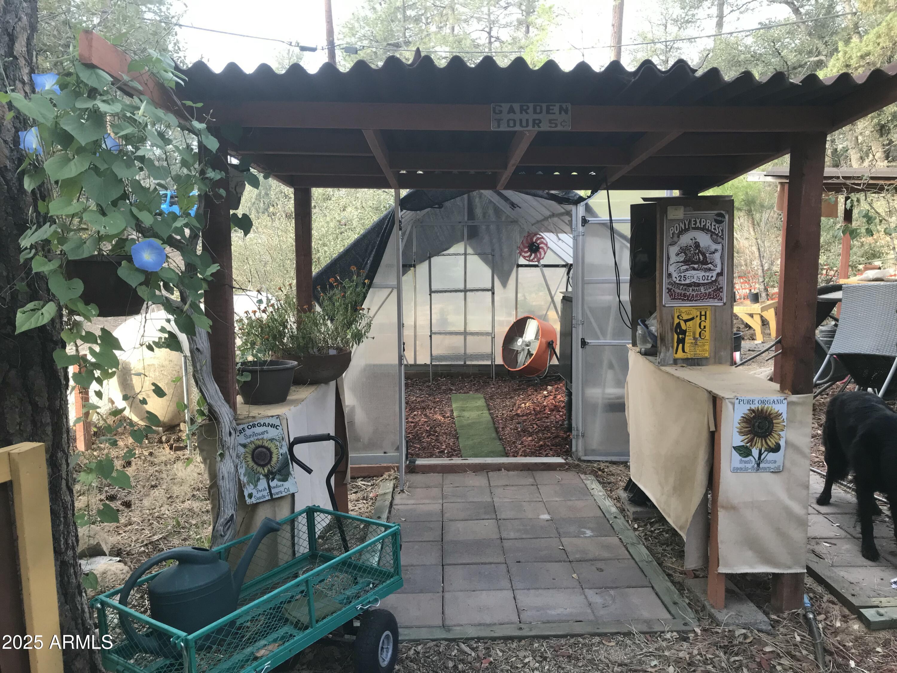 23576 Sunny South Road Crown King, AZ 86343 - Photo 13 of 29 a view of a porch with furniture