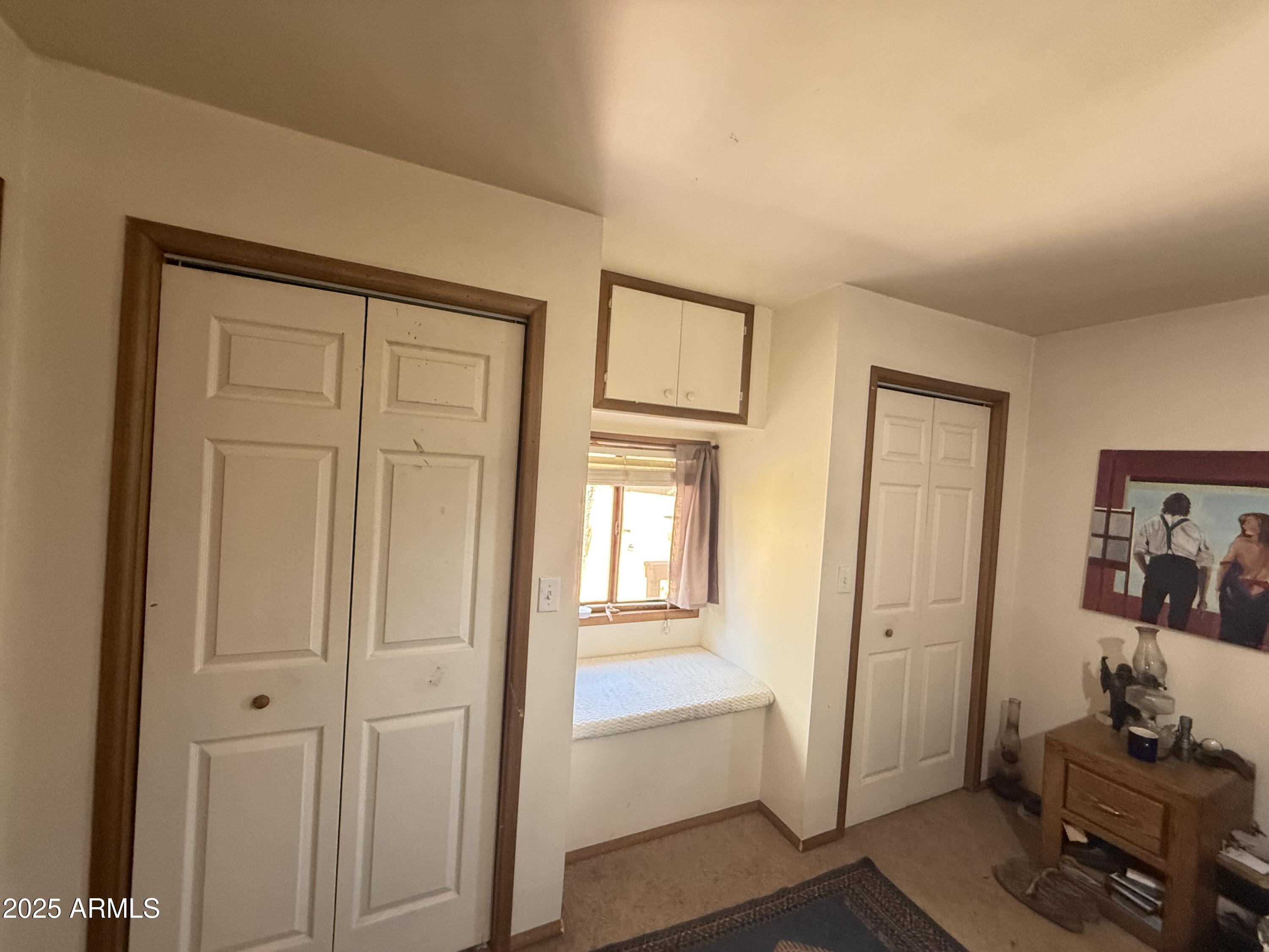 23576 Sunny South Road Crown King, AZ 86343 - Photo 16 of 29 wooden floor and windows in a room
