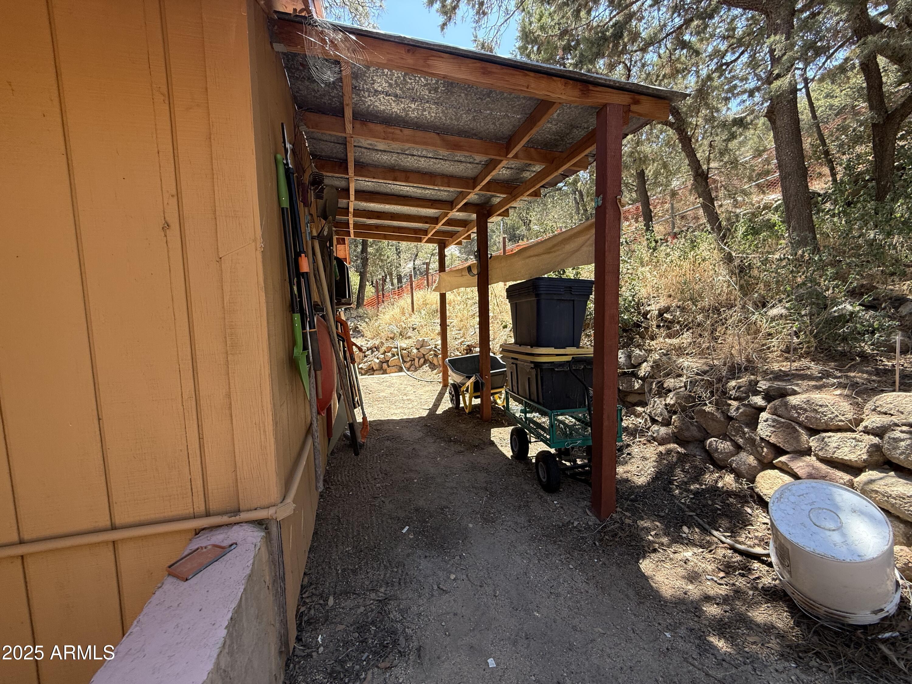 23576 Sunny South Road Crown King, AZ 86343 - Photo 22 of 29 a view of a room with wooden floor and furniture