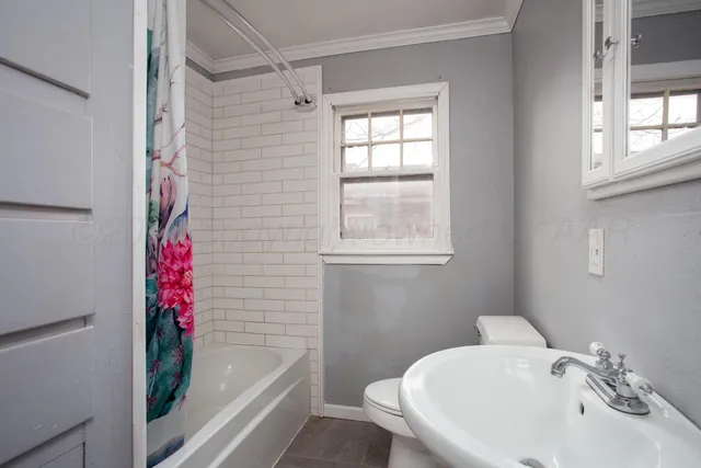 a bathroom with a sink and a bathtub