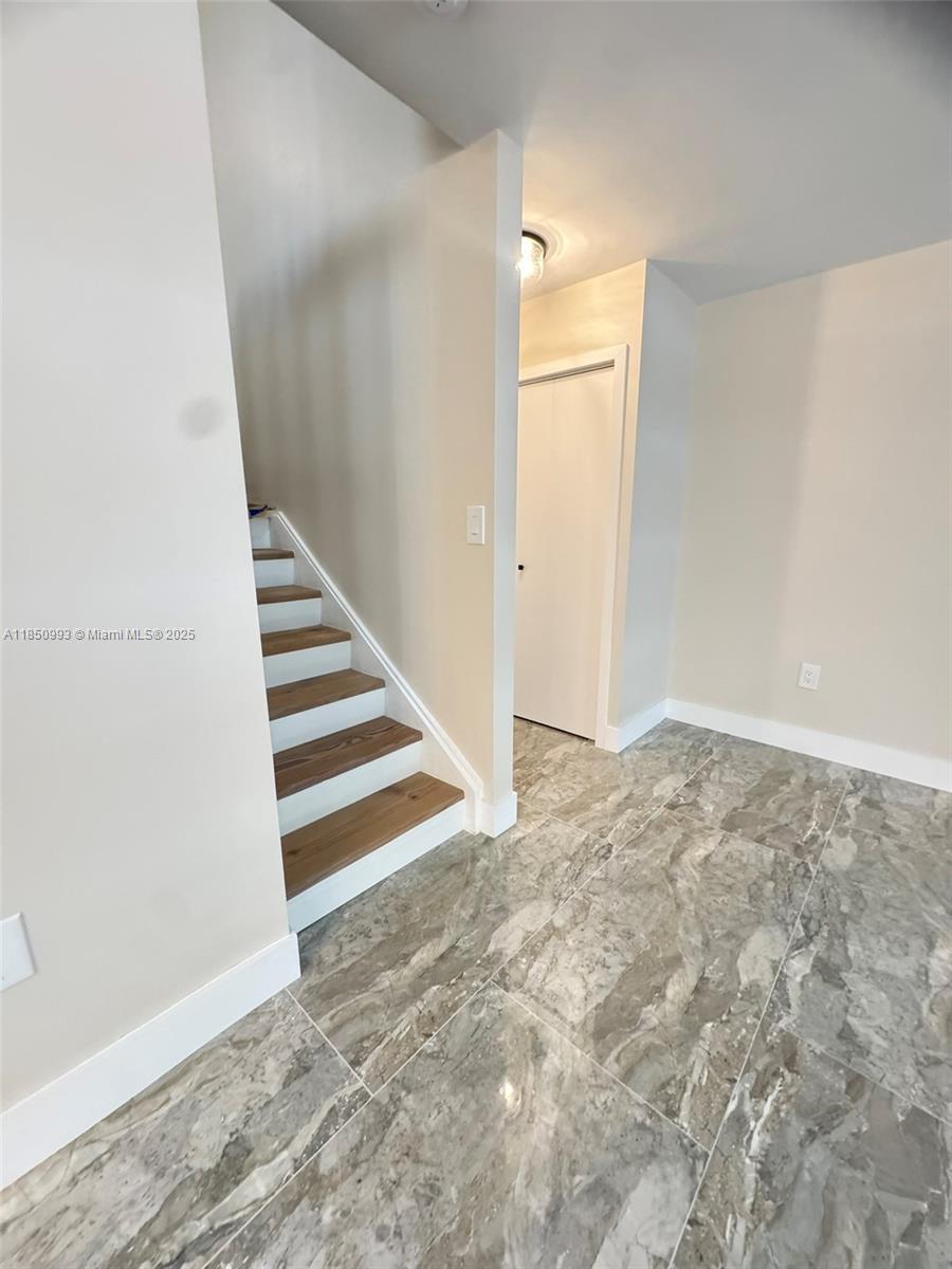 4520 Southwest 68th Ct Circle, Unit 305 Miami, FL 33155 - Photo 16 of 46 Solid wood, White Oak finished staircase