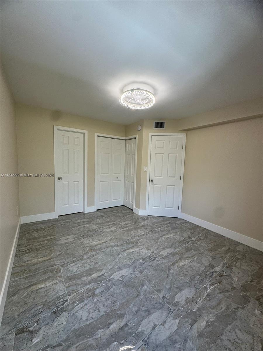 4520 Southwest 68th Ct Circle, Unit 305 Miami, FL 33155 - Photo 36 of 46 Bedroom 2 Ceiling Fan with Mood Lighting and Remote Control (in both bedrooms)