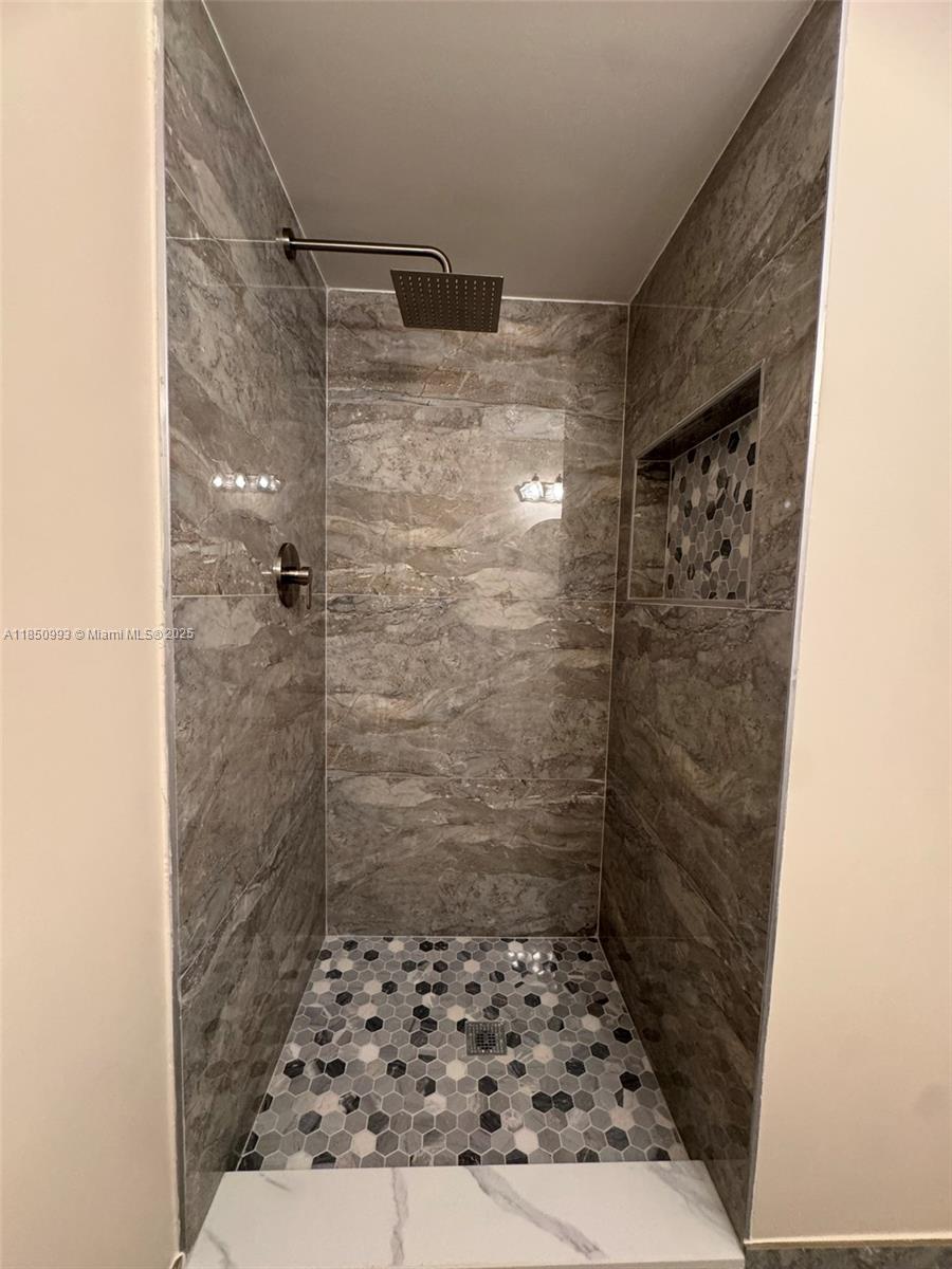4520 Southwest 68th Ct Circle, Unit 305 Miami, FL 33155 - Photo 38 of 46 a bathroom with a shower